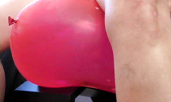 Awesome amateur girl in black panties rides a red balloon