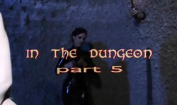 Awesome long-legged redhead Domme and her cuffed slave