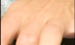 Small-tit blondie Candy Girl reveals her shaved pussy with love