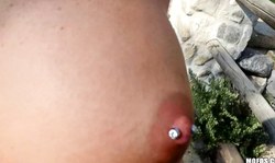 Cutie with pierced nipple Jaclyn Taylor is sucking outdoors