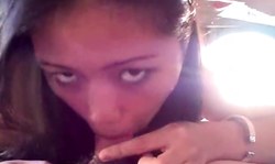 Hot-looking Asian brunette performs a very deep blowjob